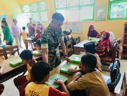 Kodim 1401/Majene Gelar Kegiatan Hasanuddin Peduli Anak Sekolah, Bagikan Makan Bergizi dan Seragam Gratis